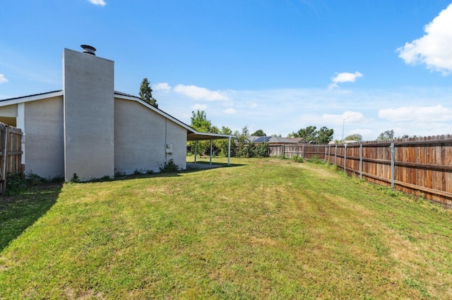 704 Rosehill Dr, Chowchilla, CA 93610 - view of yard with a fenced backyard