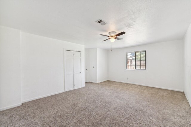 704 Rosehill Dr, Chowchilla, CA 93610 - carpeted spare room with baseboards, a ceiling fan, and visible vents
