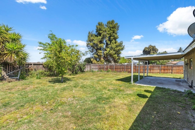 704 Rosehill Dr, Chowchilla, CA 93610 - view of yard featuring a fenced backyard and a patio