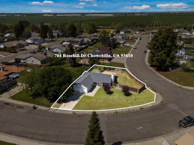 704 Rosehill Dr, Chowchilla, CA 93610 - drone / aerial view with a residential view