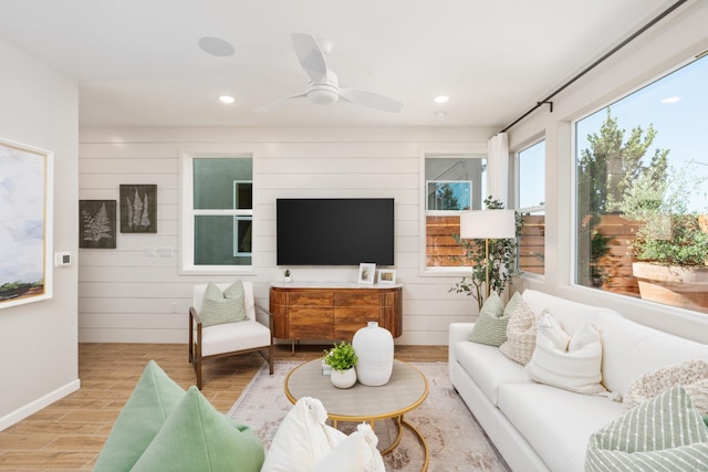 2110 N Brindac Ln, Clovis, CA 93619 - living area with wood finished floors, recessed lighting, a ceiling fan, and wooden walls