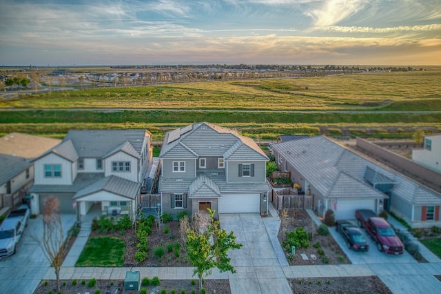 aerial view at dusk with a residential view