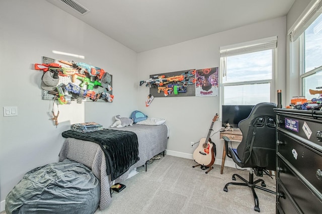 bedroom with visible vents, baseboards, and carpet floors