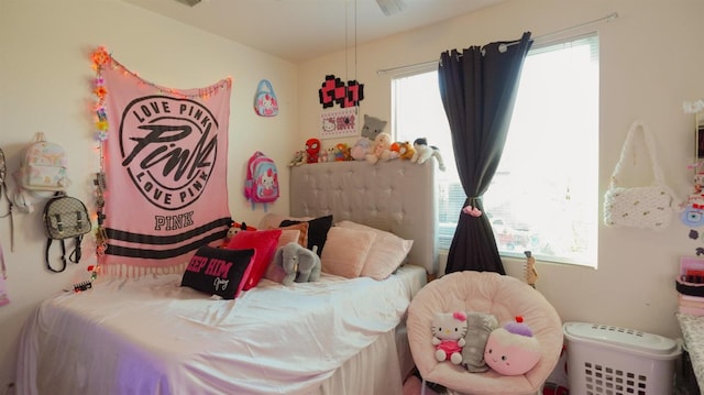bedroom featuring multiple windows