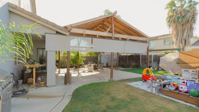 view of patio featuring fence