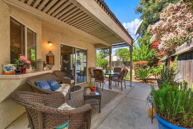 6305 N Marty Ave, Fresno, CA 93711 - view of patio with outdoor dining space and a fenced backyard