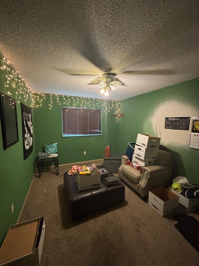 1225 Pontiac Ave, Clovis, CA 93612 - home theater featuring carpet, ceiling fan, and a textured ceiling
