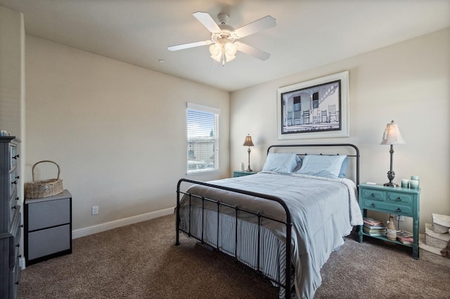 bedroom featuring baseboards, ceiling fan, and carpet