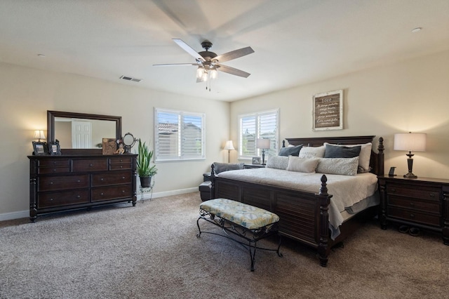 bedroom featuring visible vents, carpet flooring, ceiling fan, and baseboards