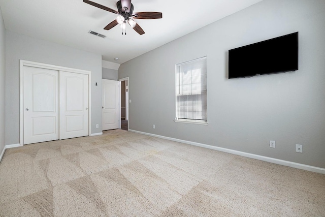 4650 W Roberts Ave, Fresno, CA 93722 - unfurnished bedroom featuring a closet, carpet, baseboards, and a ceiling fan