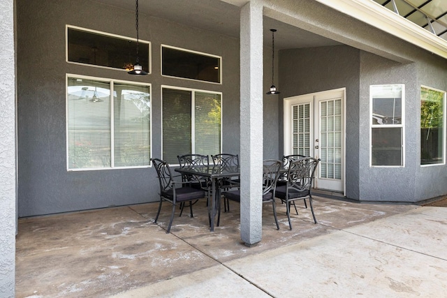 4650 W Roberts Ave, Fresno, CA 93722 - view of patio / terrace featuring french doors and outdoor dining space