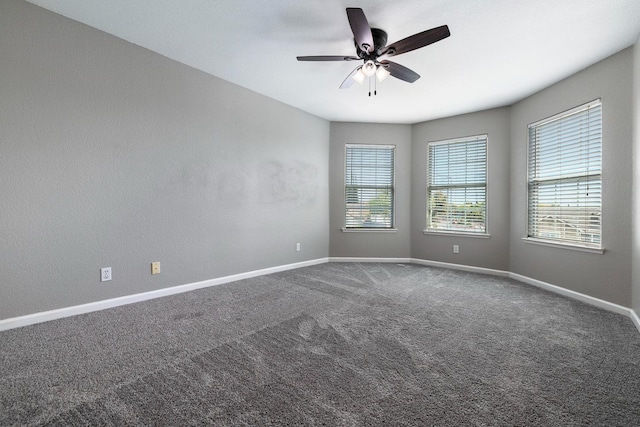 4650 W Roberts Ave, Fresno, CA 93722 - unfurnished room featuring baseboards, carpet, and a ceiling fan