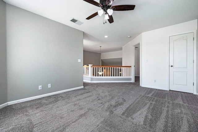 4650 W Roberts Ave, Fresno, CA 93722 - spare room featuring a ceiling fan, carpet, baseboards, and recessed lighting