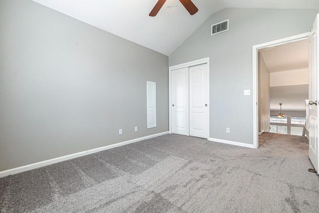 4650 W Roberts Ave, Fresno, CA 93722 - unfurnished bedroom with lofted ceiling, carpet flooring, a closet, baseboards, and a ceiling fan