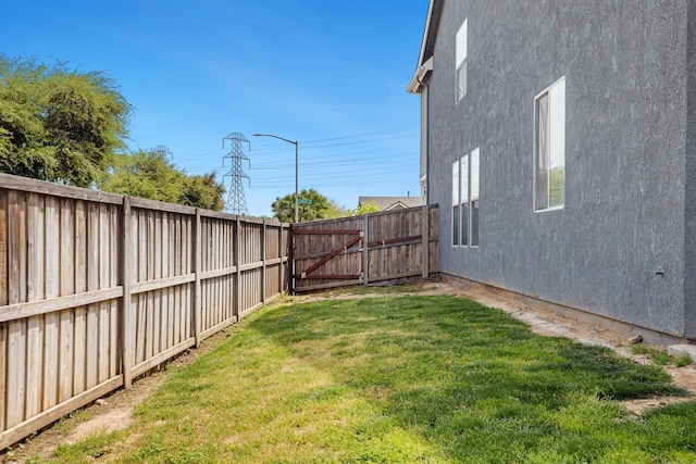 4650 W Roberts Ave, Fresno, CA 93722 - view of yard featuring a gate