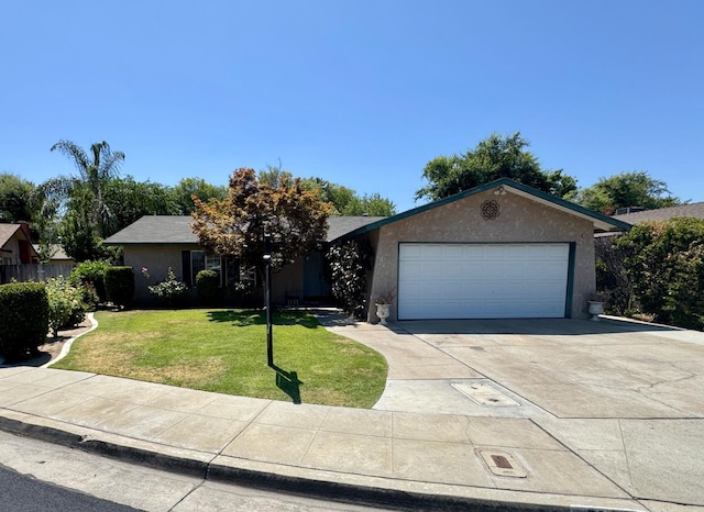 3140 Timmy Ave, Clovis, CA 93612 - ranch-style house featuring an attached garage, concrete driveway, stucco siding, and a front yard
