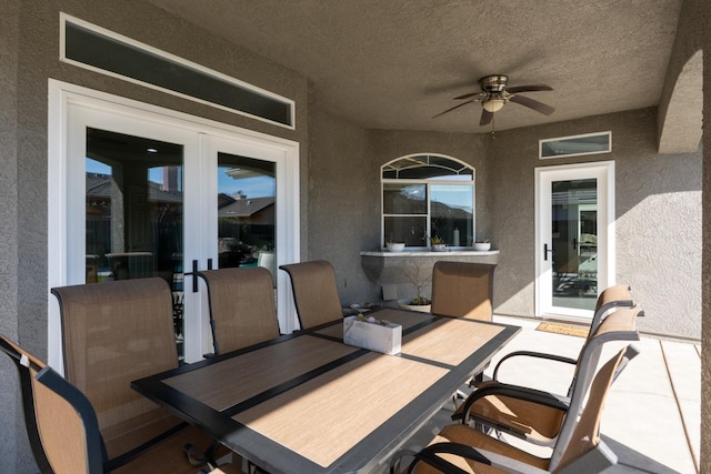 view of patio / terrace featuring outdoor dining space and ceiling fan