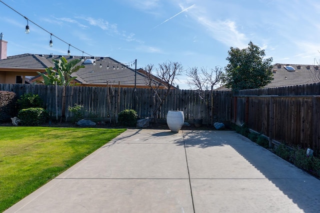 view of patio with a fenced backyard