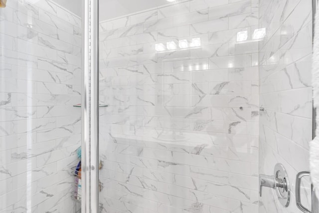 bathroom featuring a stall shower