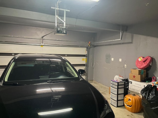 garage featuring a garage door opener