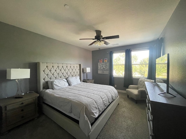 bedroom with visible vents, ceiling fan, and carpet flooring