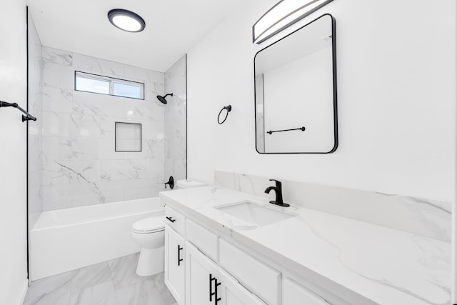 5873 W Wathen, Fresno, CA 93722 - bathroom with marble finish flooring, vanity, toilet, and bathtub / shower combination