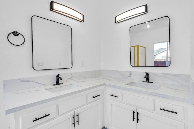5873 W Wathen, Fresno, CA 93722 - bathroom featuring double vanity