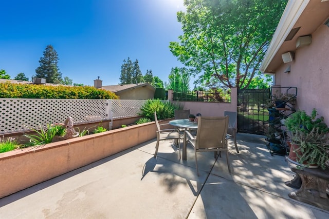 18778 Shore Dr, Madera, CA 93638 - view of patio with outdoor dining area and fence