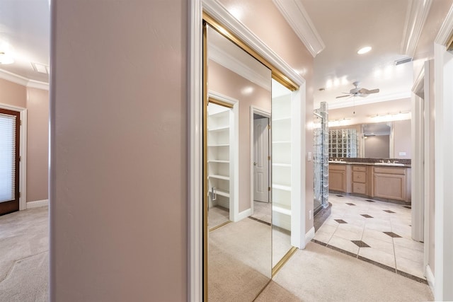 18778 Shore Dr, Madera, CA 93638 - bathroom with visible vents, baseboards, ornamental molding, a walk in closet, and vanity