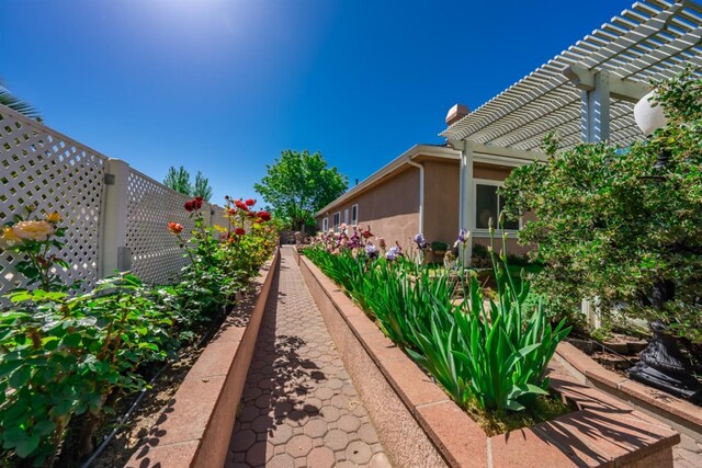 18778 Shore Dr, Madera, CA 93638 - view of home's exterior with stucco siding and fence