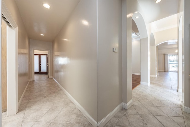 18778 Shore Dr, Madera, CA 93638 - corridor with arched walkways, light tile patterned flooring, baseboards, and recessed lighting