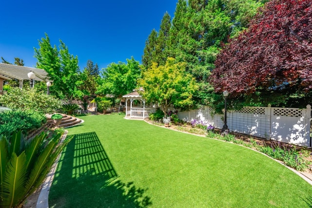 18778 Shore Dr, Madera, CA 93638 - view of yard featuring a pergola, a gazebo, and a fenced backyard