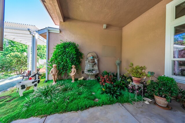 18778 Shore Dr, Madera, CA 93638 - exterior space featuring a pergola, stucco siding, and a patio area
