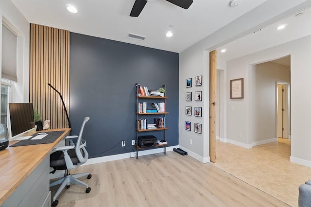 home office featuring wood finished floors, ceiling fan, visible vents, and recessed lighting