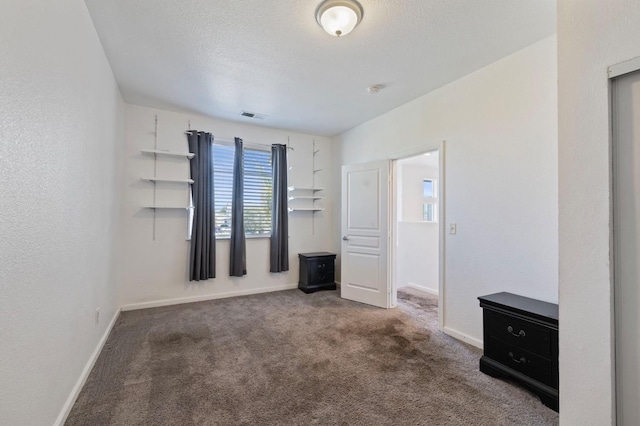 2594 S Duke Ave, Fresno, CA 93727 - carpeted empty room featuring visible vents and baseboards
