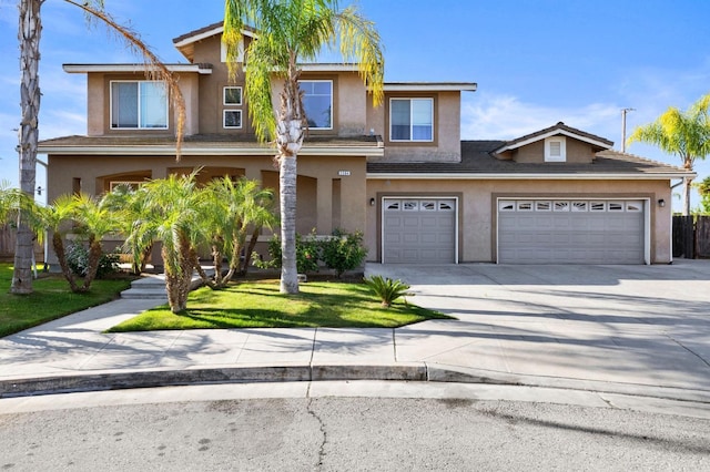 2594 S Duke Ave, Fresno, CA 93727 - traditional-style home featuring concrete driveway and stucco siding