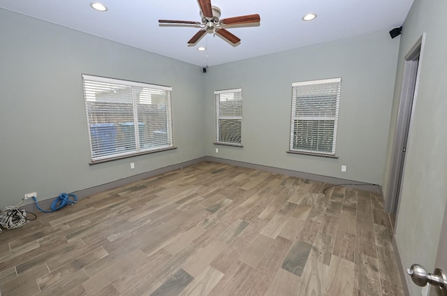 738 Century Ln, Clovis, CA 93612 - spare room featuring recessed lighting, light wood-type flooring, and a ceiling fan