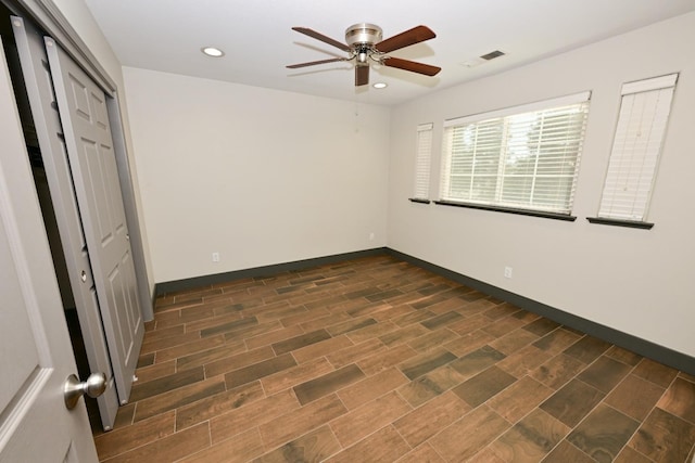 738 Century Ln, Clovis, CA 93612 - unfurnished bedroom featuring ceiling fan, dark wood finished floors, visible vents, recessed lighting, and baseboards