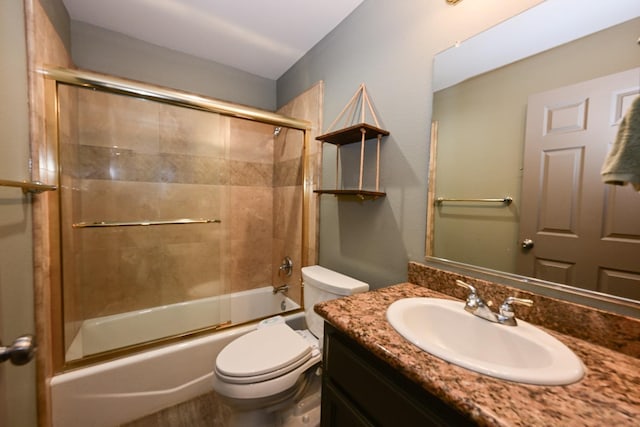 738 Century Ln, Clovis, CA 93612 - full bath featuring toilet, vanity, and combined bath / shower with glass door