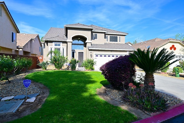 738 Century Ln, Clovis, CA 93612 - view of front of property with stucco siding, fence, a front lawn, an attached garage, and concrete driveway