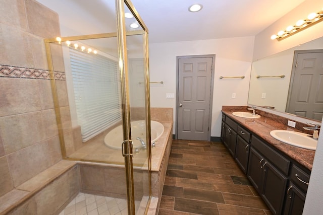 738 Century Ln, Clovis, CA 93612 - bathroom with a bath, a stall shower, double vanity, and a sink
