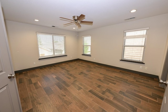738 Century Ln, Clovis, CA 93612 - spare room featuring visible vents, a ceiling fan, recessed lighting, and dark wood-style floors