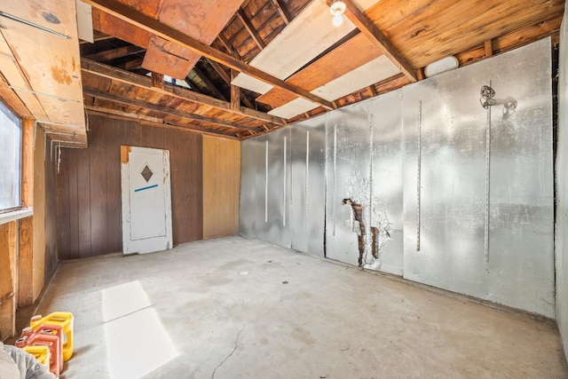 811 E Cambridge Ave, Fresno, CA 93704 - interior space with concrete floors and wooden walls