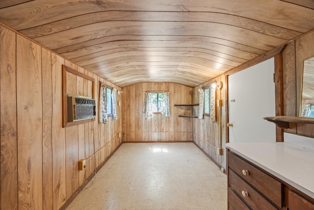 811 E Cambridge Ave, Fresno, CA 93704 - bonus room with wooden walls, vaulted ceiling, light flooring, and an AC wall unit