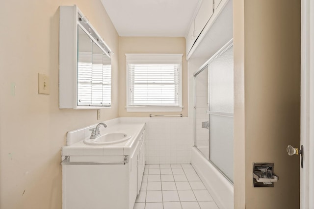 811 E Cambridge Ave, Fresno, CA 93704 - full bathroom with vanity, tile patterned flooring, and combined bath / shower with glass door