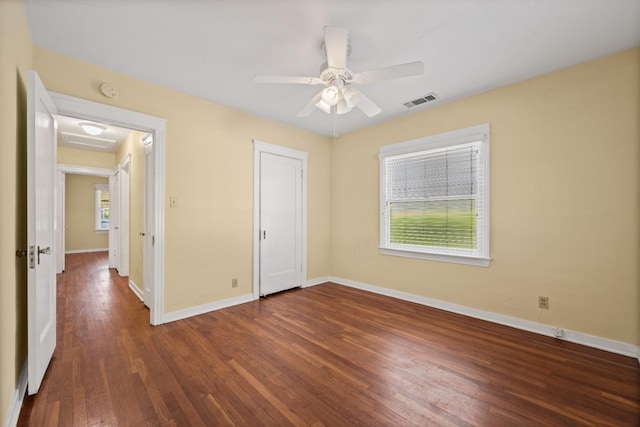 811 E Cambridge Ave, Fresno, CA 93704 - unfurnished bedroom with attic access, wood finished floors, baseboards, and ceiling fan