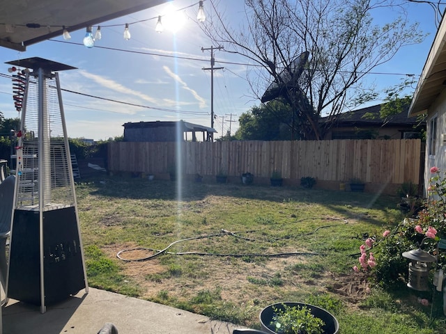 view of yard featuring a fenced backyard