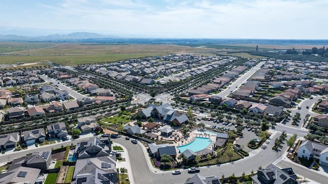 bird's eye view featuring a residential view and a mountain view