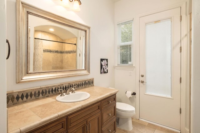 bathroom with vanity, tile patterned flooring, toilet, and a shower with shower curtain
