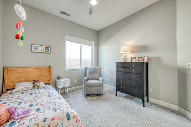 8389 N Paula Ave, Fresno, CA 93720 - bedroom with carpet flooring, baseboards, a ceiling fan, and visible vents